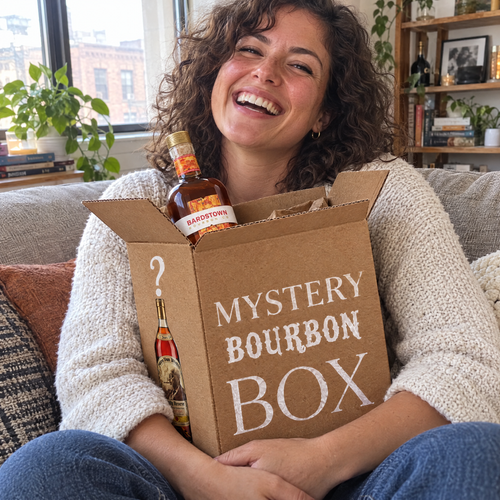 Laughing with the box on the sofa